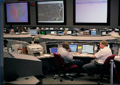 Command Center staff manage the flow of air traffic when weather, equipment, runway closures, or other conditions are expected to place stress on the NAS.